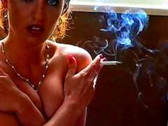 Busty milf reveals her tits while smoking